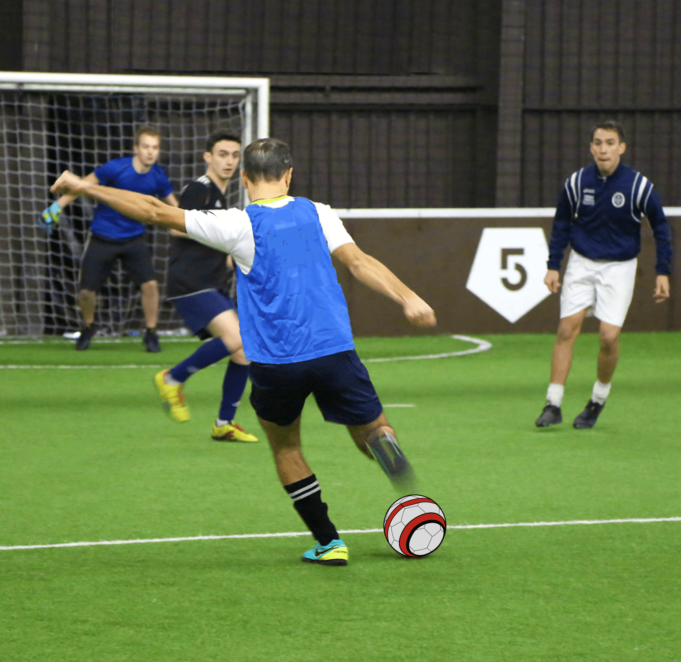 A soccer player shooting a Poteau ball