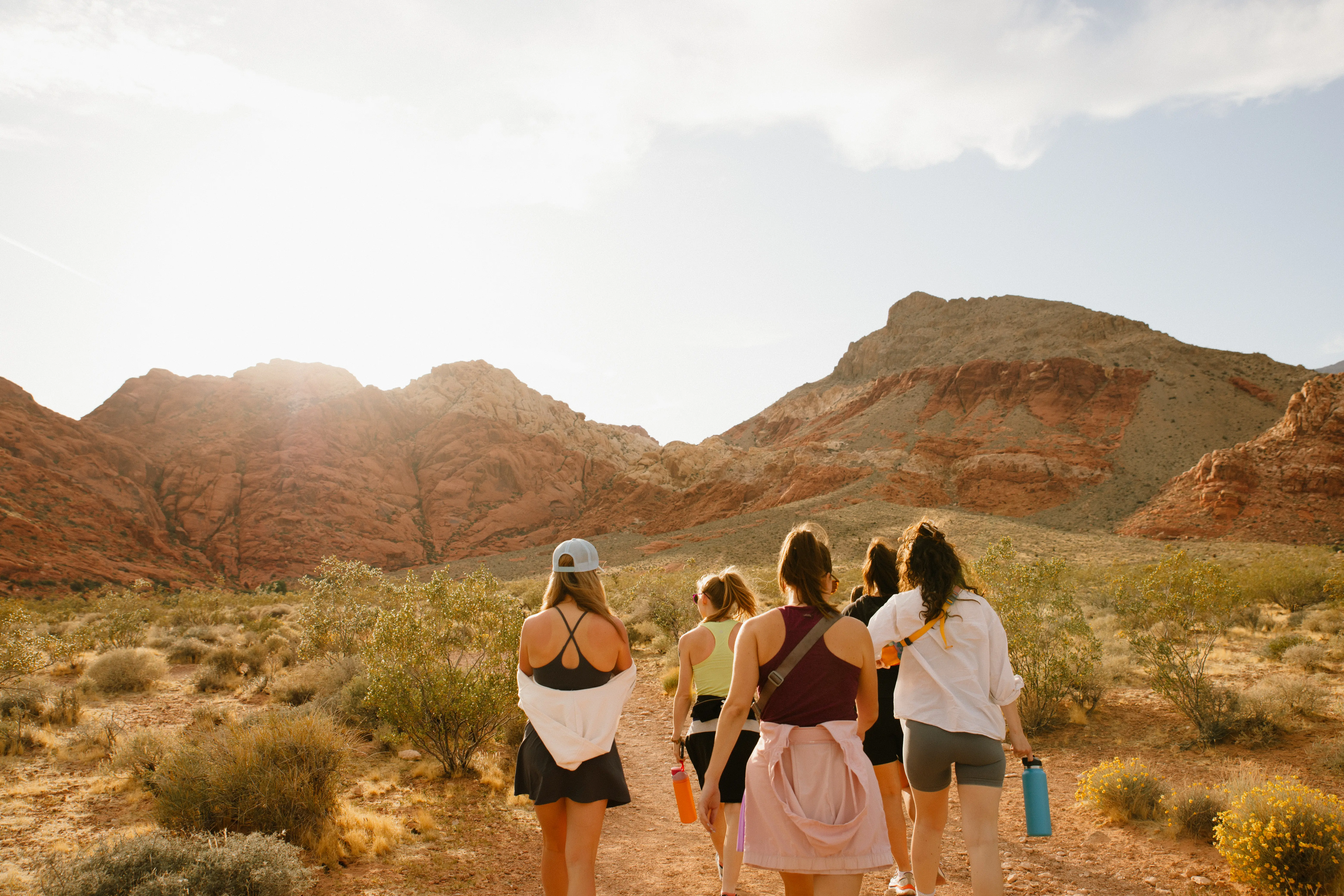 Streetside billboard with flyposters of the Batch.Works brand and illustrations