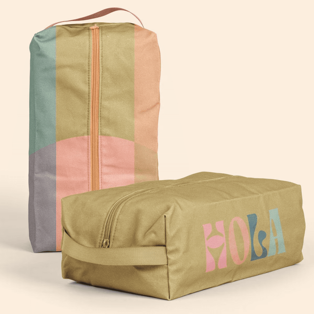 2 4cp Pigment Dyed Canvas Dopp kits on a cream backdrop.