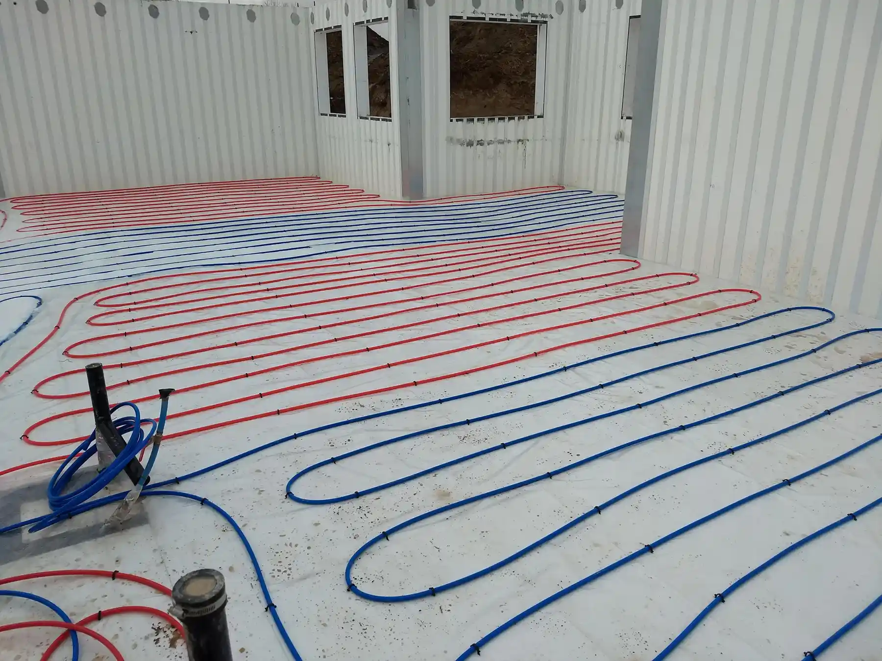 Heated flooring system running through an ICF home