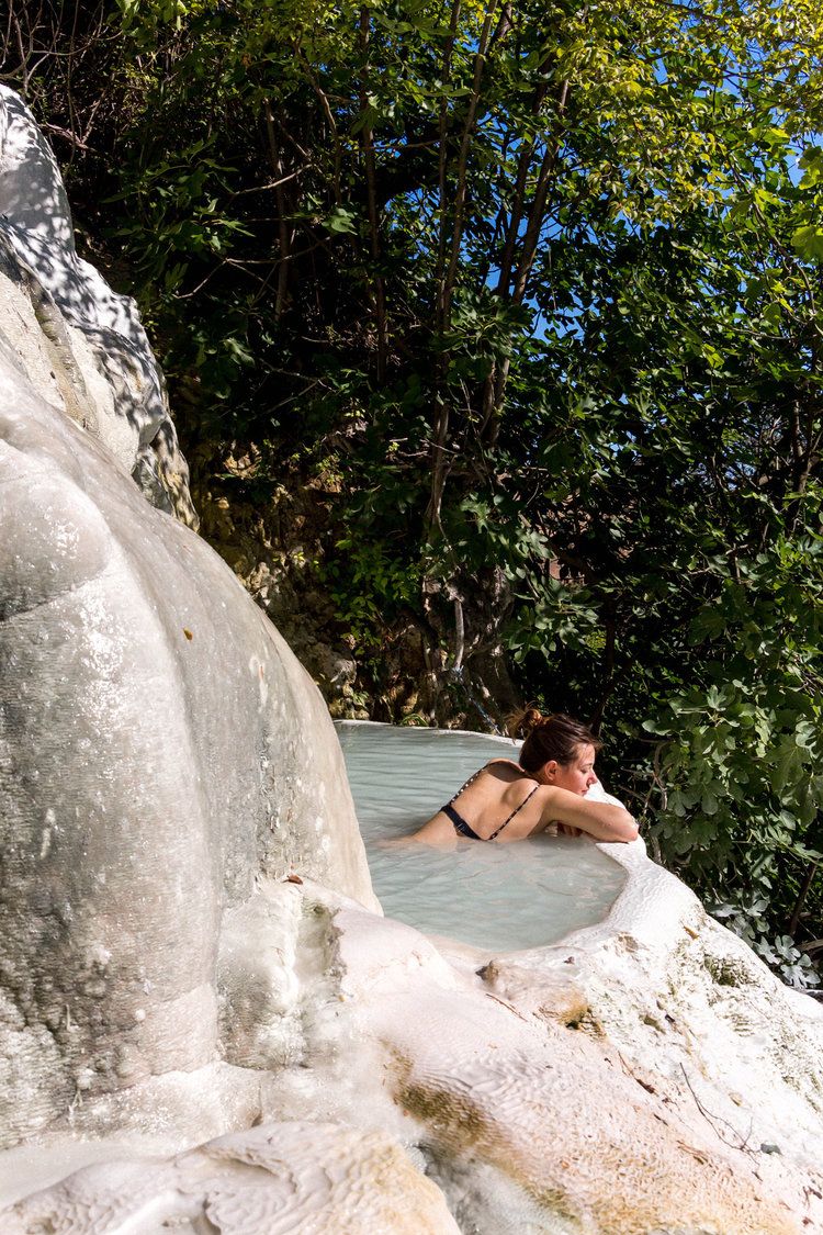 Bagni San Filippo thermal waters cascading over white limestone rocks in Val d'Orcia, Tuscany