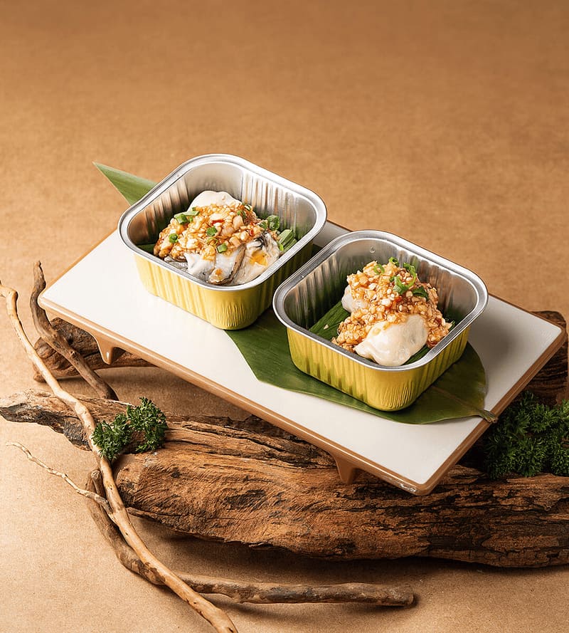 Garlic oyster plating restaurant photography by Lefty Studio