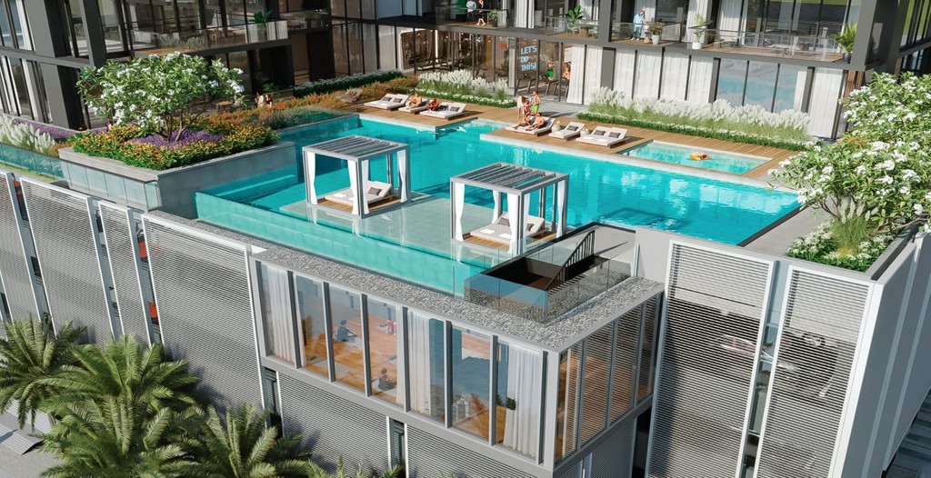 A pool surrounded by palm trees, with a large building in the background, identified as The Crestmark.