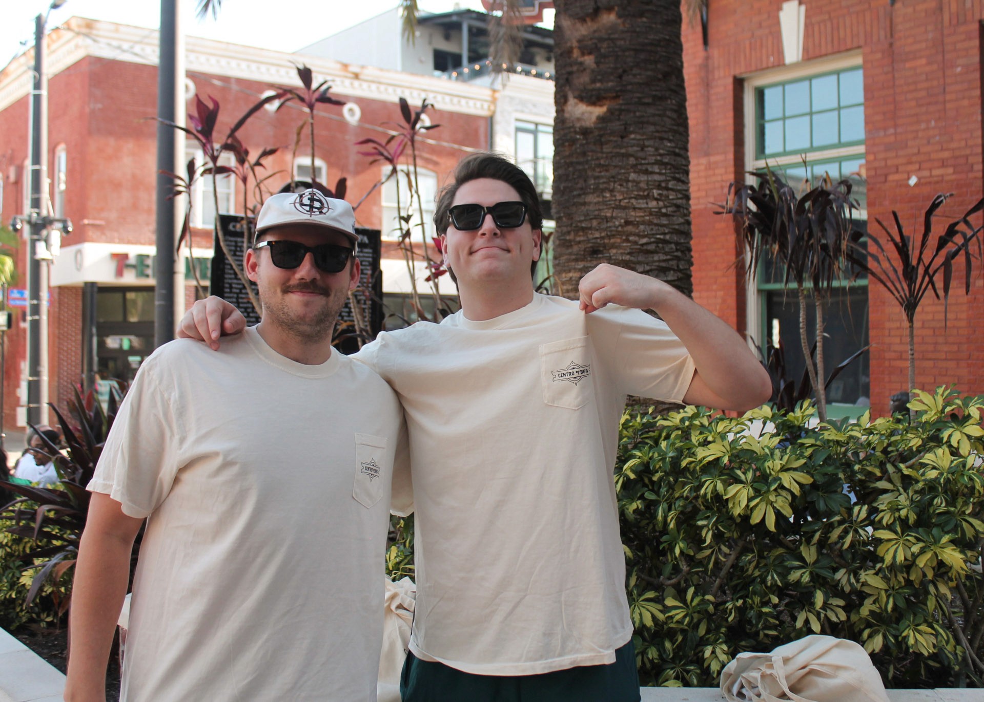Two men wearing Centro Ybor shirts