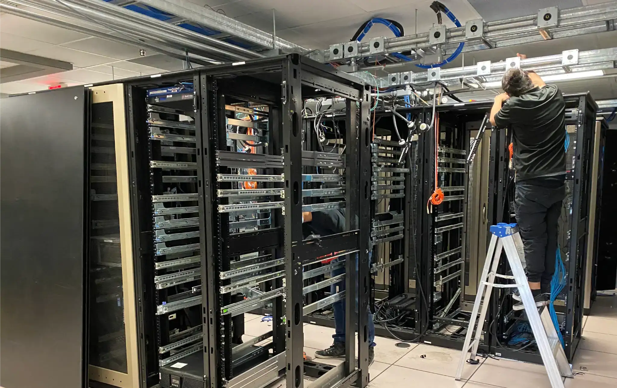 Professional data center decommission with cable removal, equipment teardown, and server rack disassembly