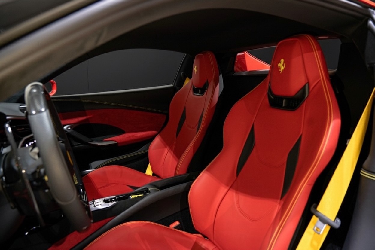 Ferrari 296 GTB red leather seats premium interior by Queen of Supercar Rental Dubai