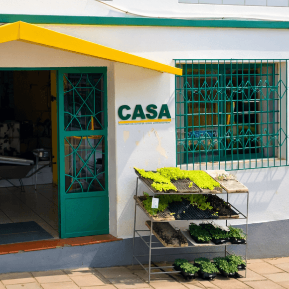 woman in gray hijab and gray coat