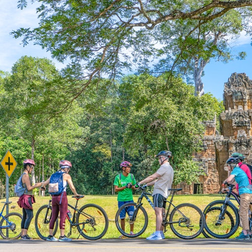 Explore the fascinating beauty of Bayon Temple, Terrace of Elephants, and Baphoun Temple at the Angkor Thom complex.