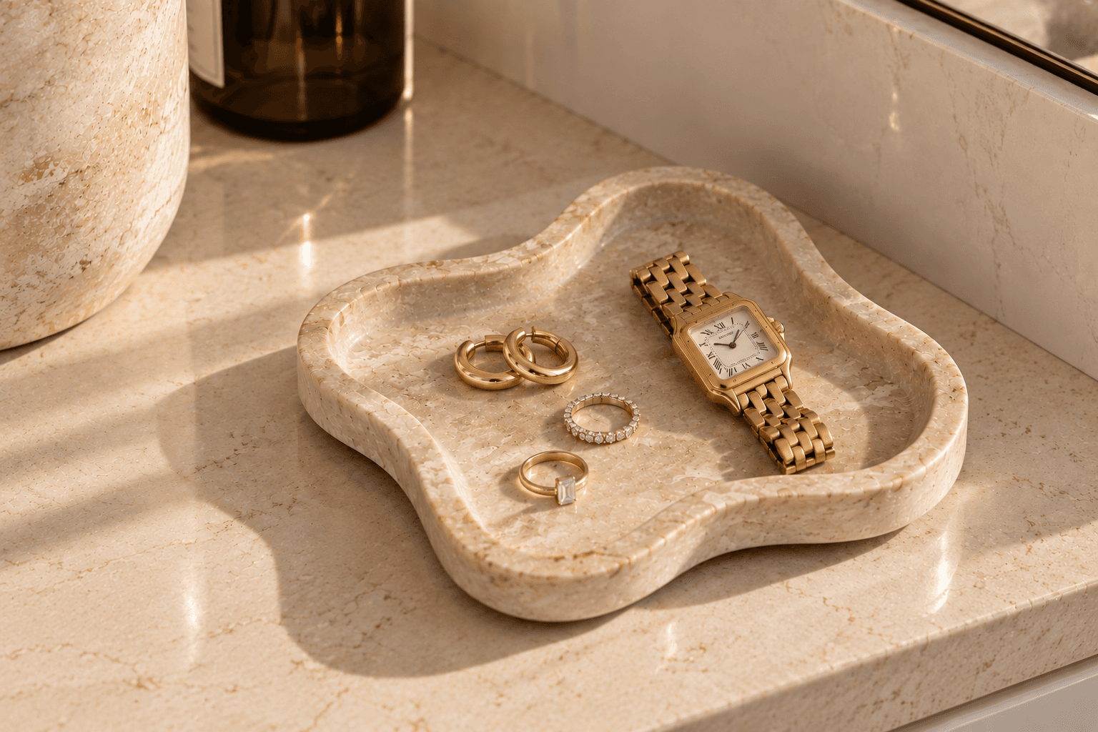 Small tray holding a watch, rings and earrings.