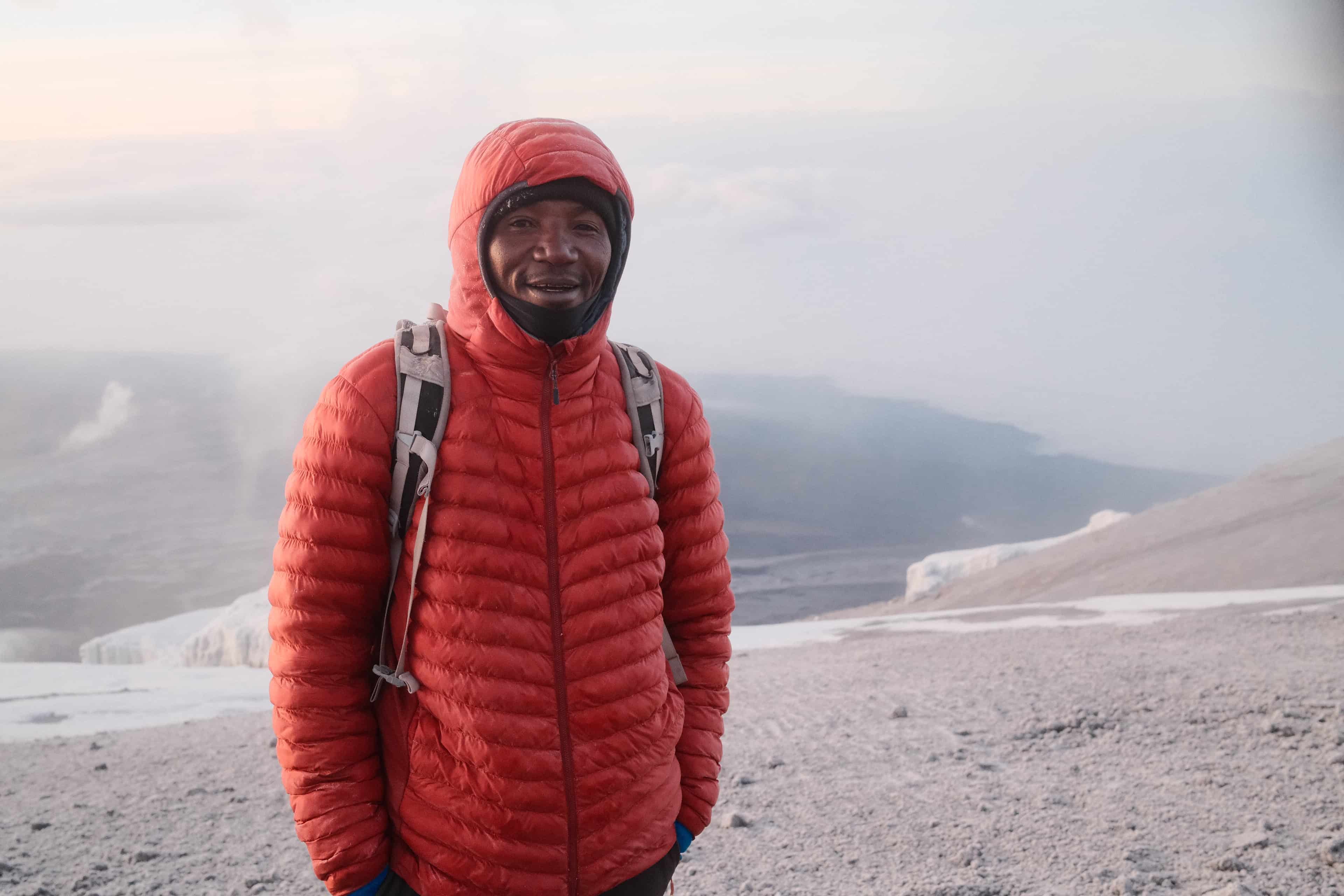 A Legend Expeditions guide team and camp set-up on Kilimanjaro with oxygen and safety equipment carried as standard.