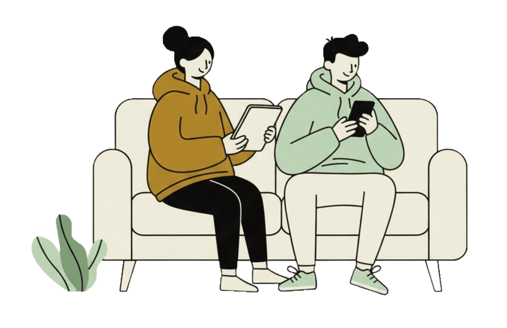 Two guys sitting on a coach chilling and relaxing in the meantime they take a look on their phones