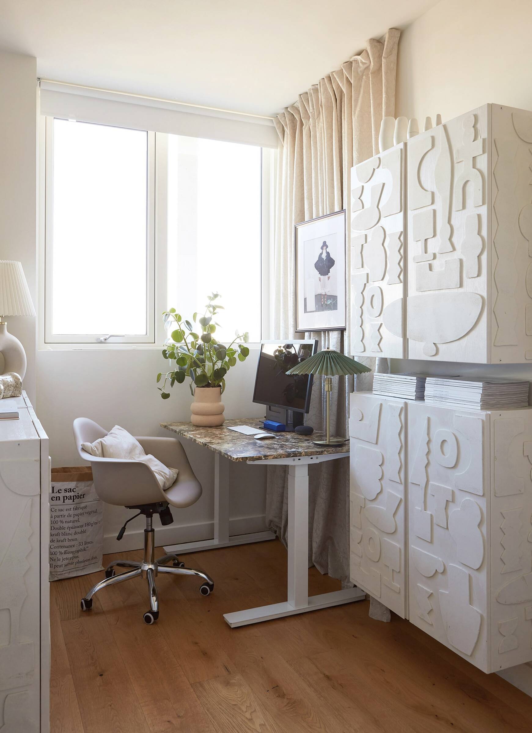 Interior design studio Atelier Akuko uses storytelling to create characterful textures for storage in a London new build office.