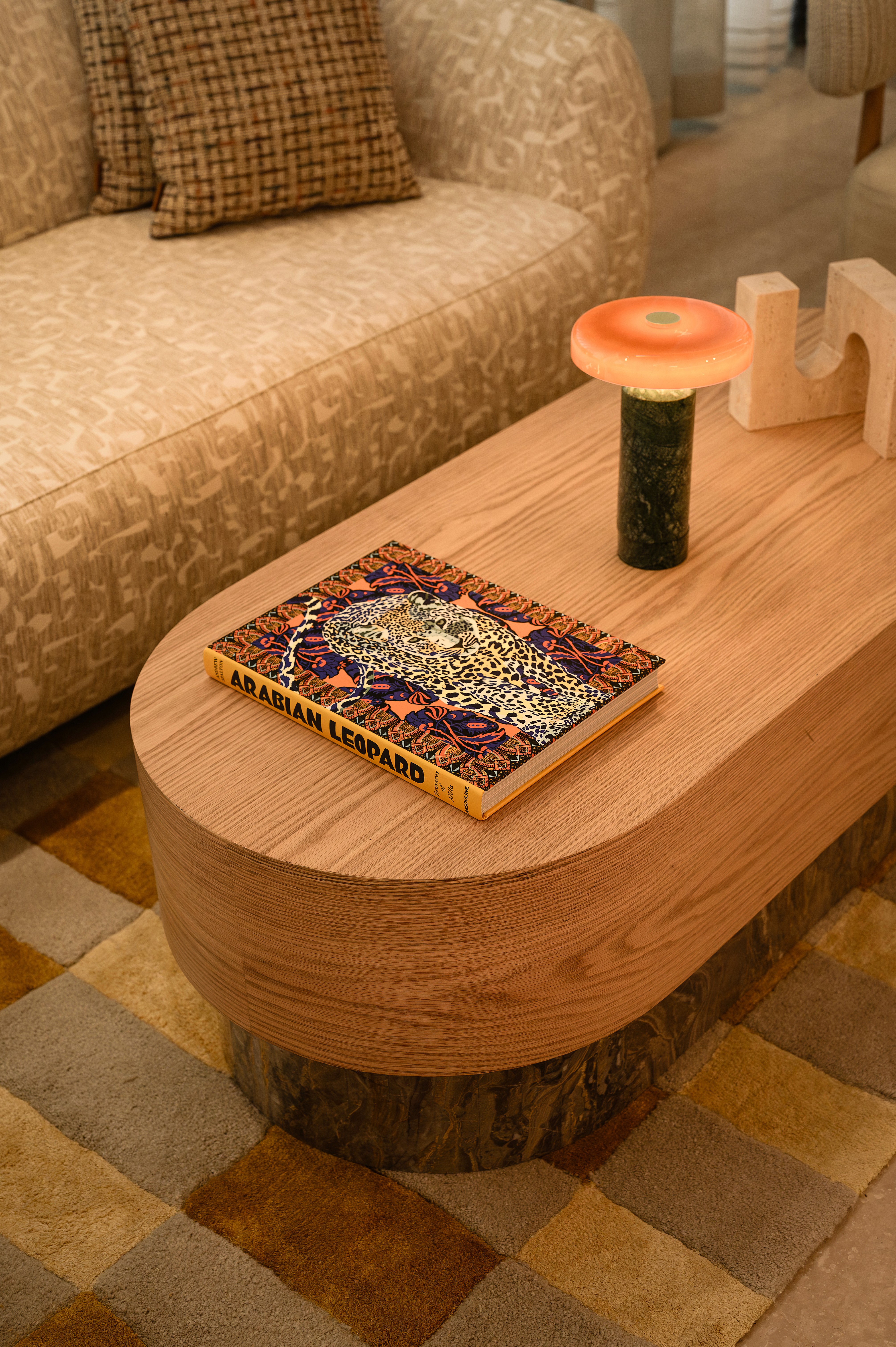 A close-up shot of a handcrafted welcome cocktail served at a Mediterranean hotel patio