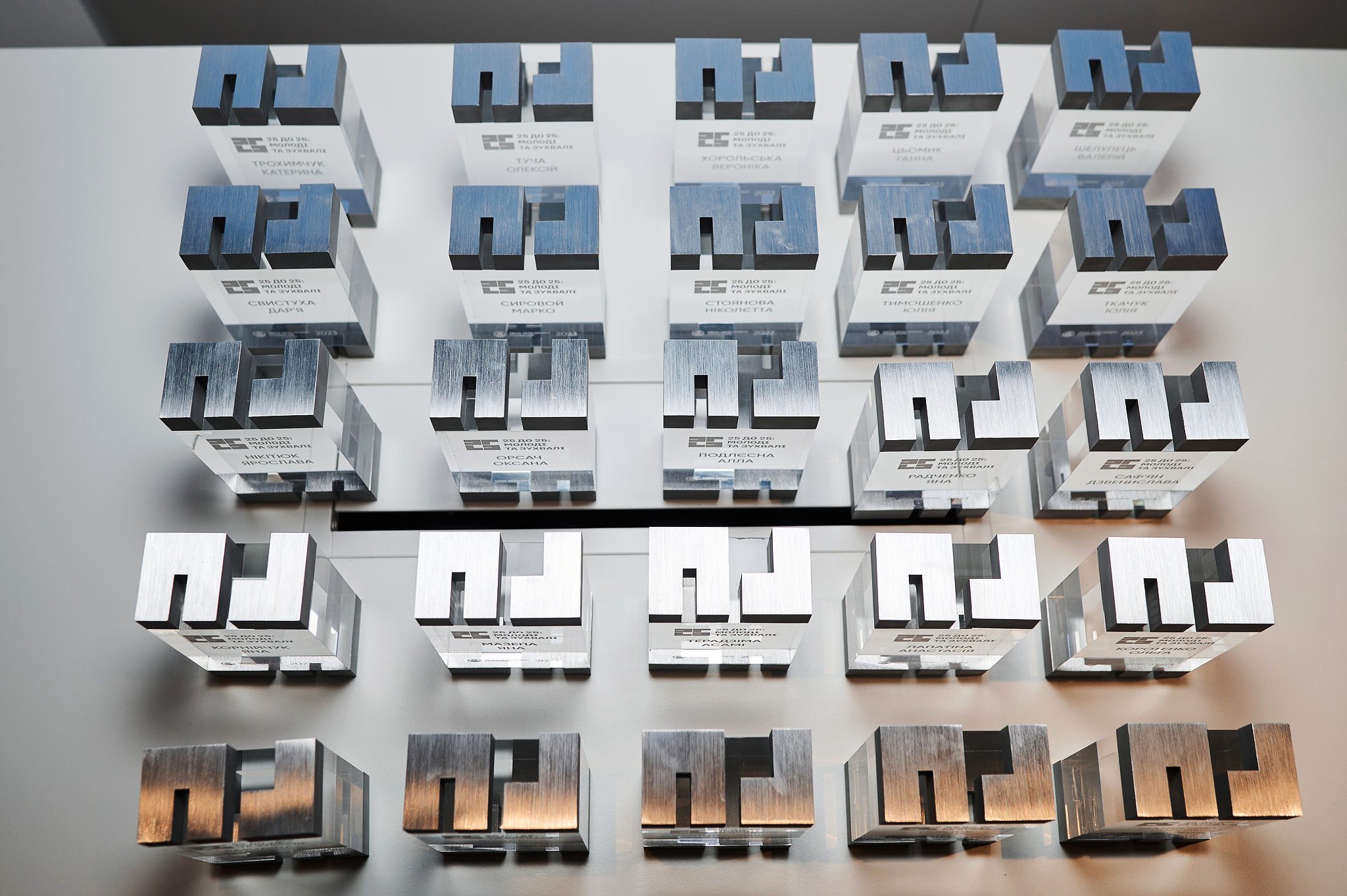 Panel discussion at an AI conference featuring experts in product, technology, and business.