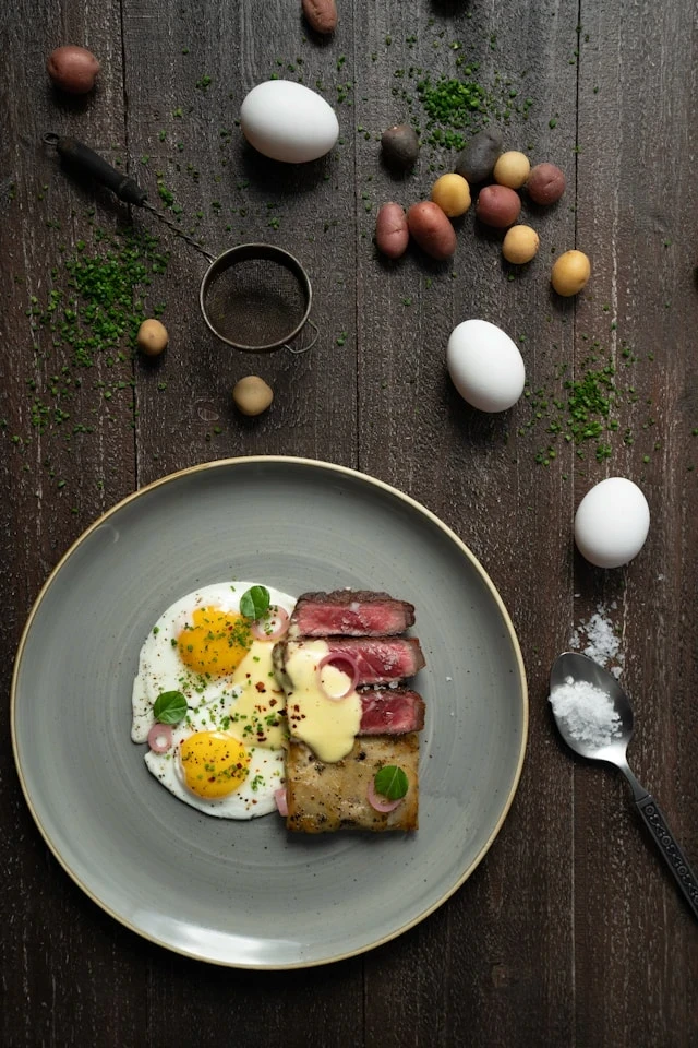 Typical carnivore diet plate with steak, eggs, and butter.