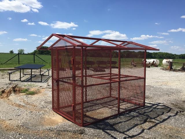 This is a photo of a personnel safety cage.  It is fabricated with metal square tubing and expanded metal sheets.  This was designed and fabricated per custom client specifications.  This is a common welding project.