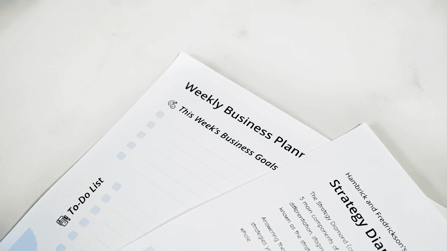 a man and a woman sitting at a white table