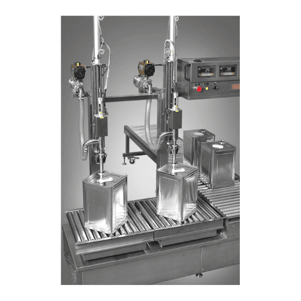A close-up of the filling nozzles of a semi-auto tin weight filling machine descending into containers.