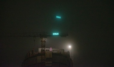 a couple of air conditioners sitting next to each other