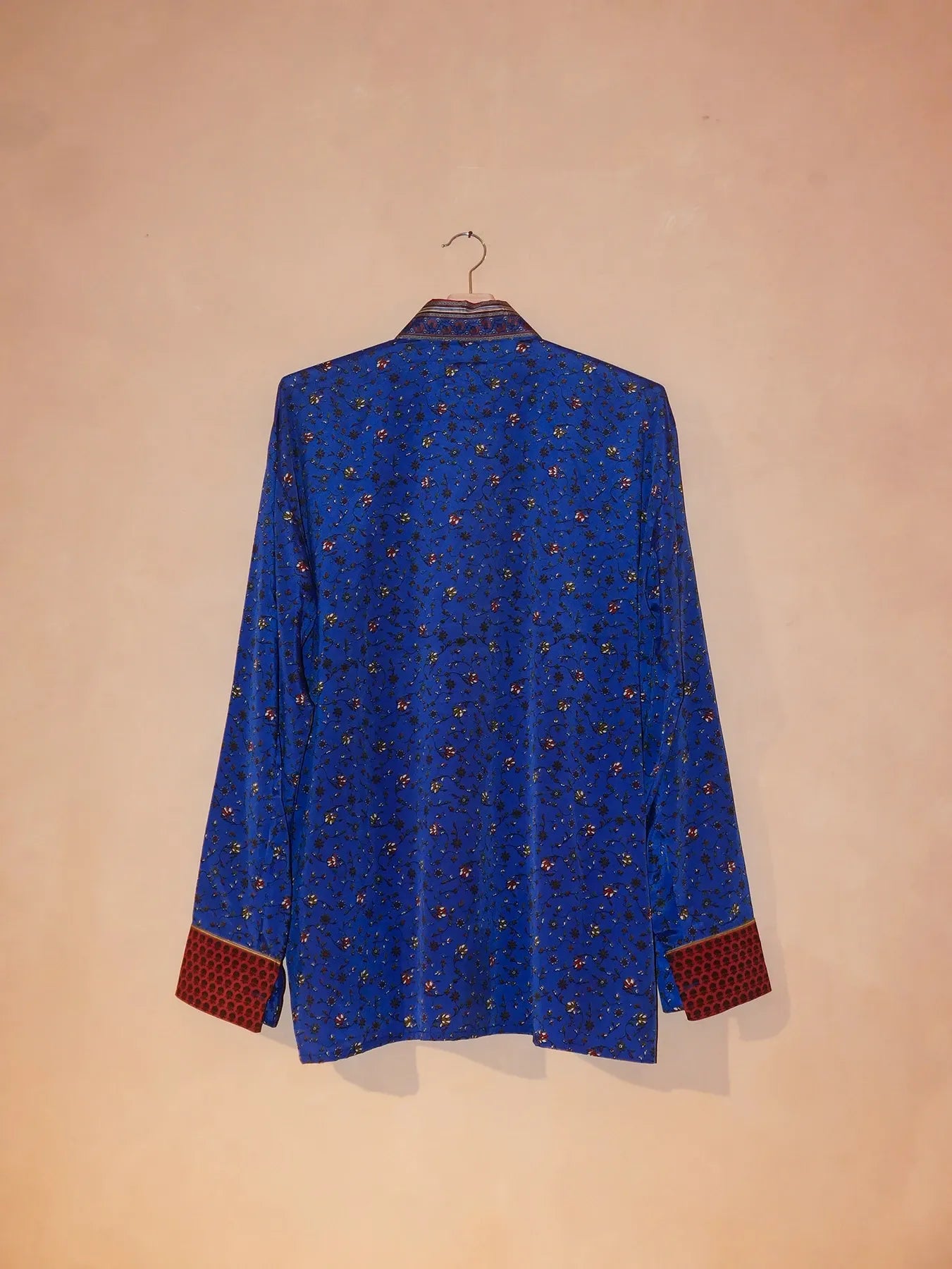 LAVYA III is a one-of-a-kind full-sleeve shirt, crafted from vintage fabric in a bold multicolour butterfly print.