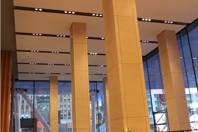 Columns and small light fixtures built into the ceiling