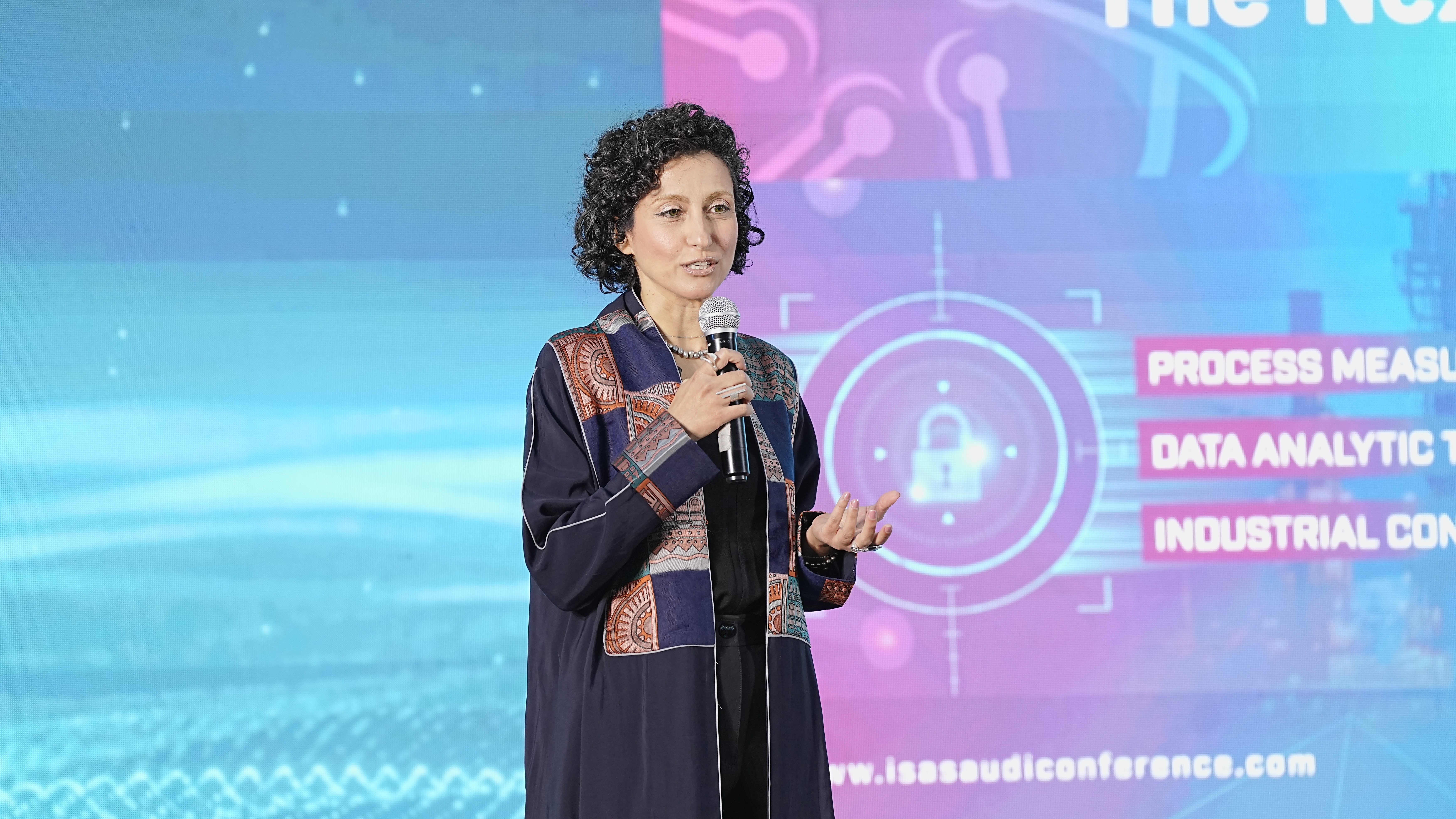 Woman talking to a Man using Mic