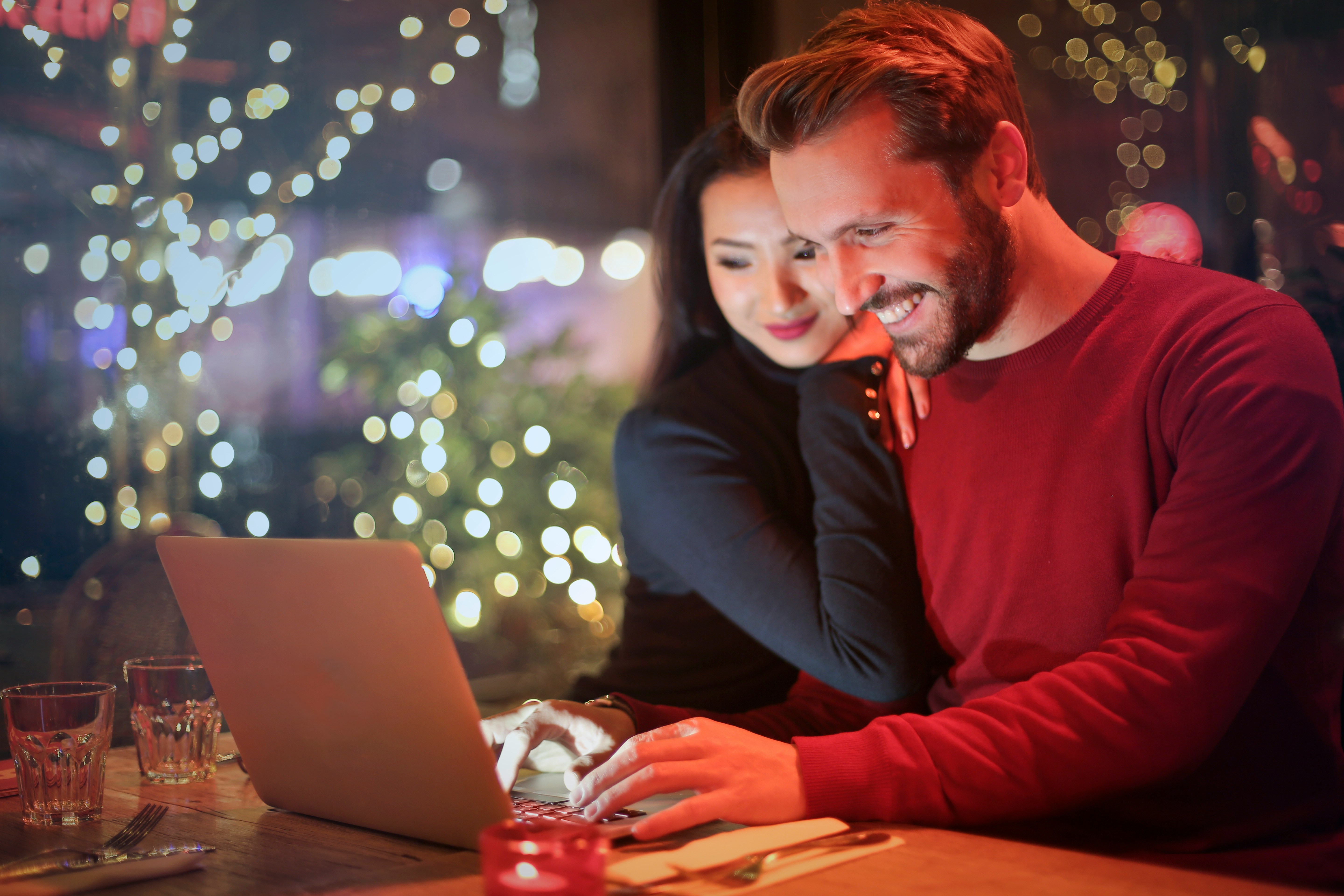 couple with laptop - Fall Couple Outfits