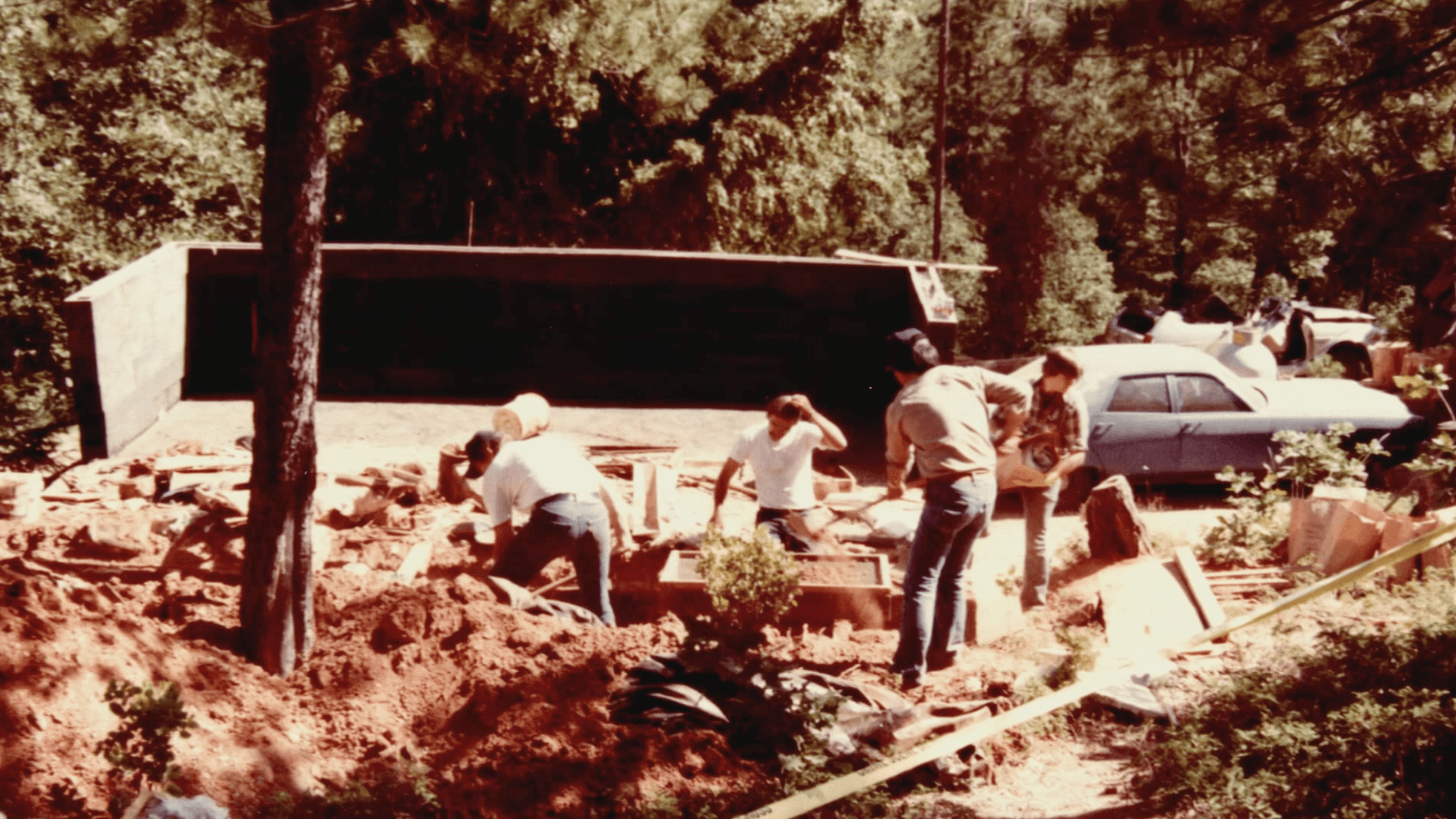 Streetside billboard with flyposters of the Batch.Works brand and illustrations