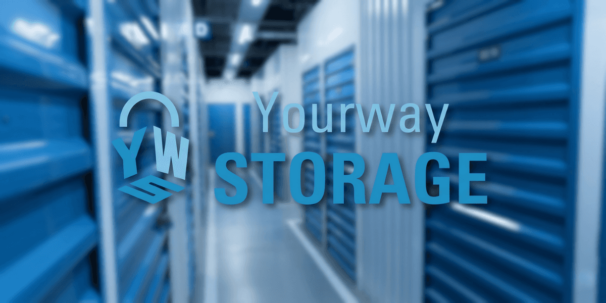 Modern self-storage facility hallway with blue storage units and YourWay Storage branding. 