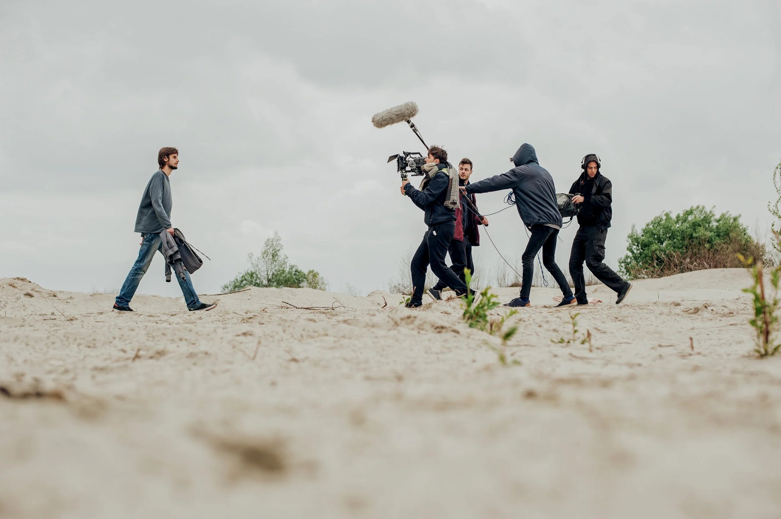 ACE Media film crew working outdoors at sunset