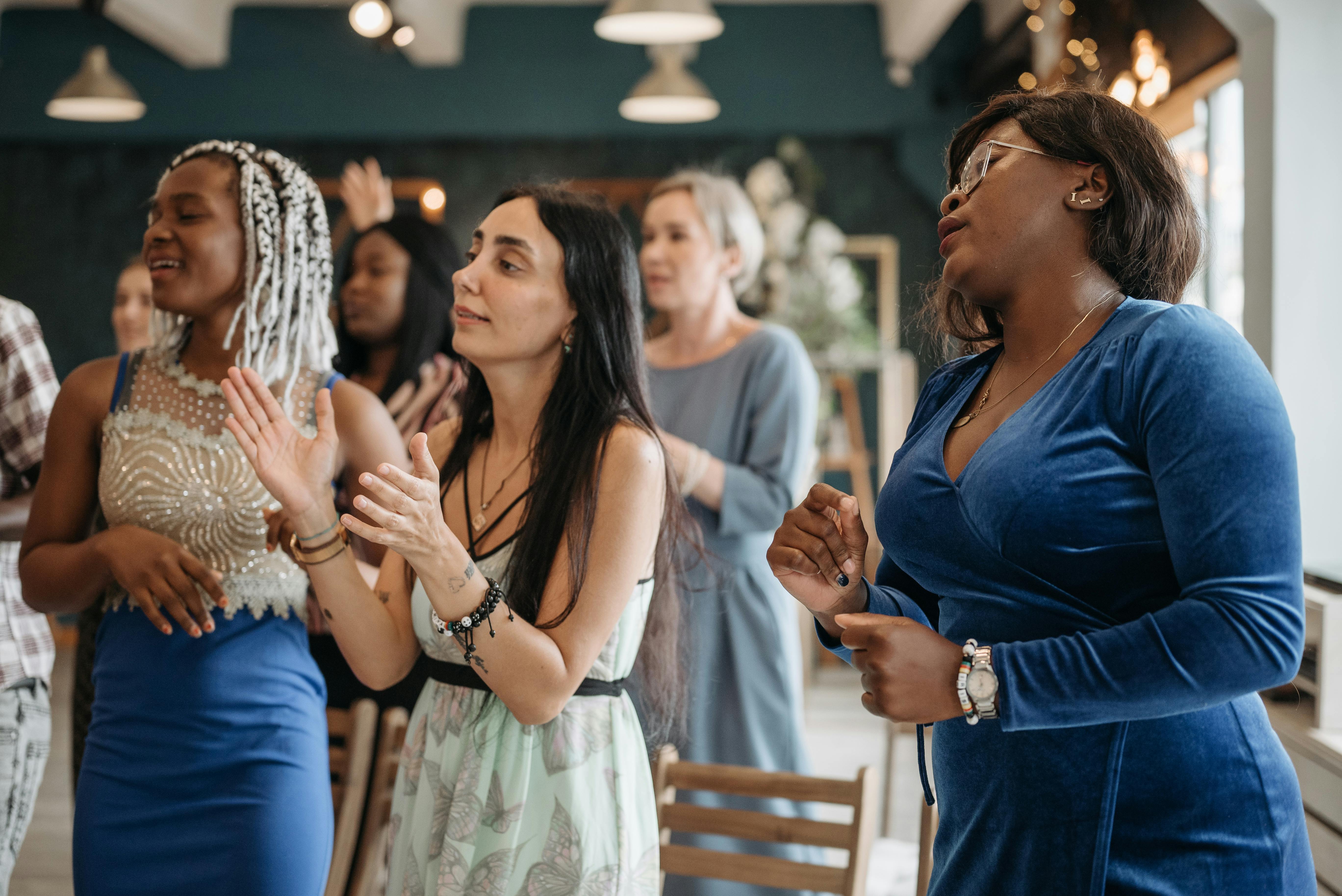 A woman giving thanks to God