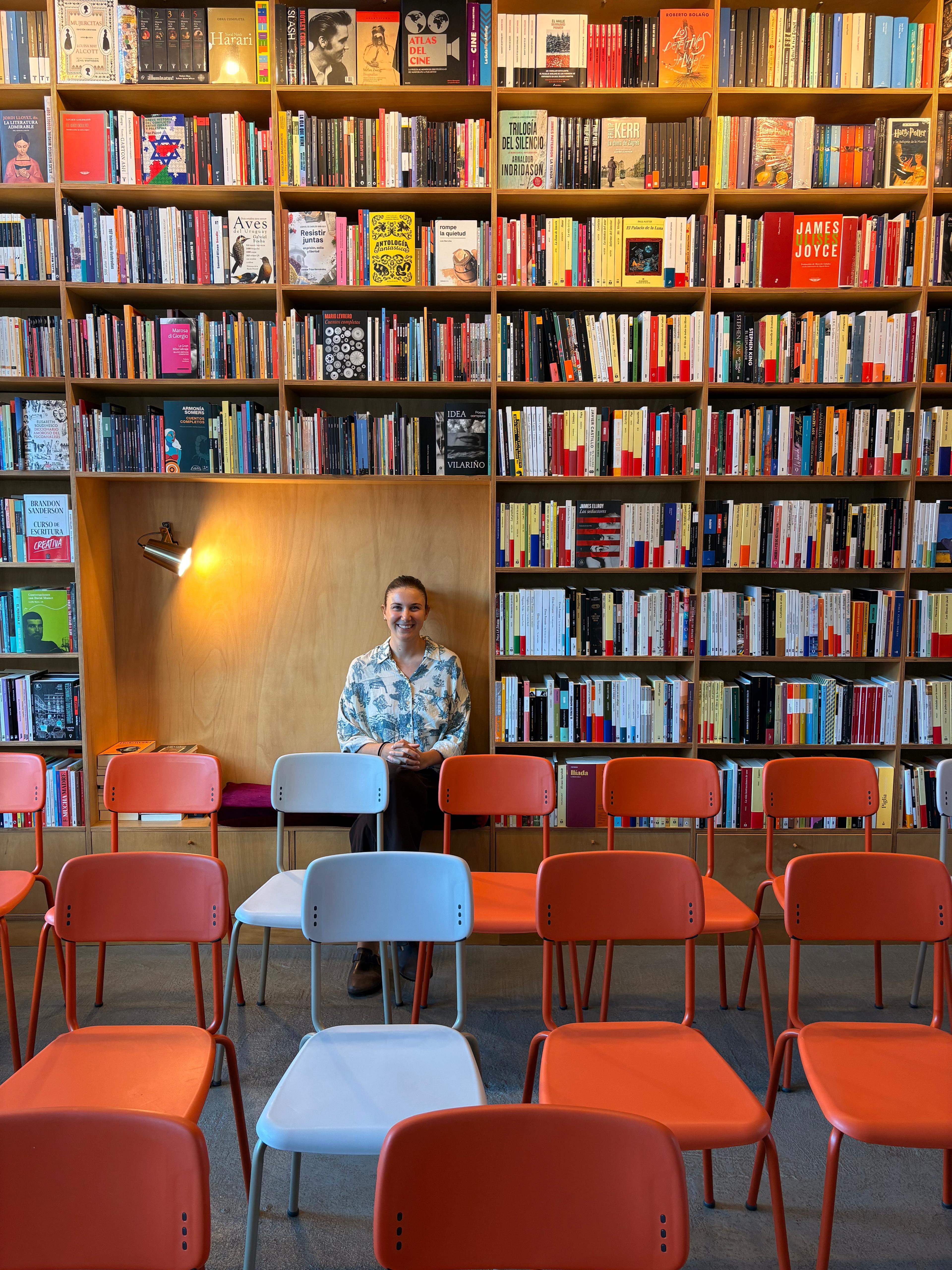 man filming on beach