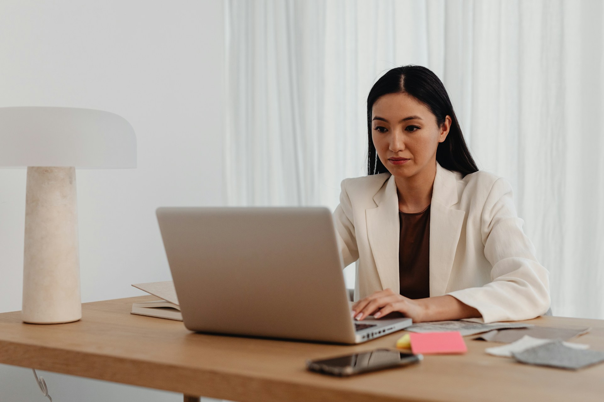 Business woman working on laptop