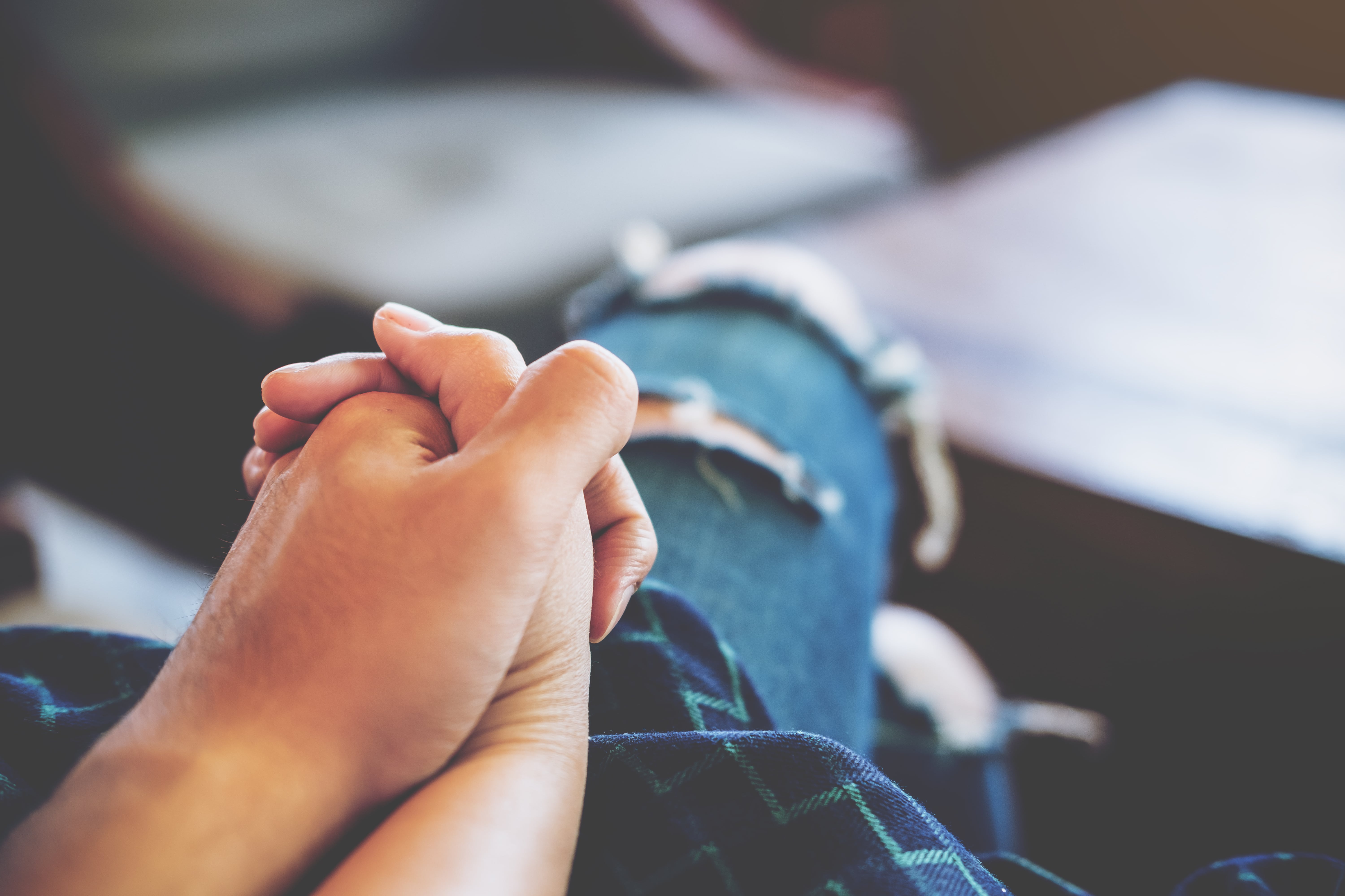 A close up of clasped hands 