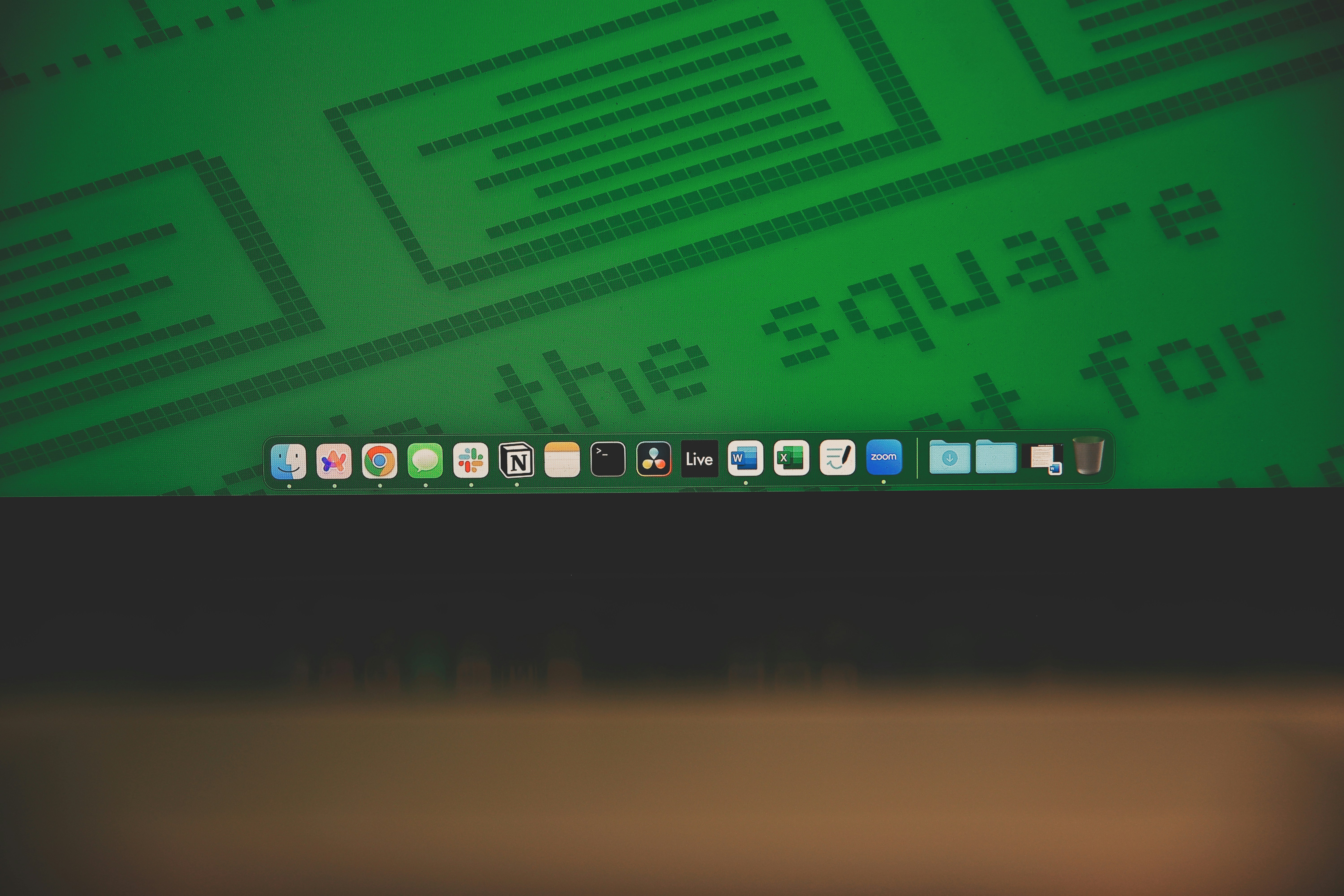 Computer screen showing software interface with dock and applications on macOS