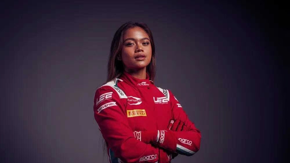 Bianca Bustamante arms crossed driver photoshoot