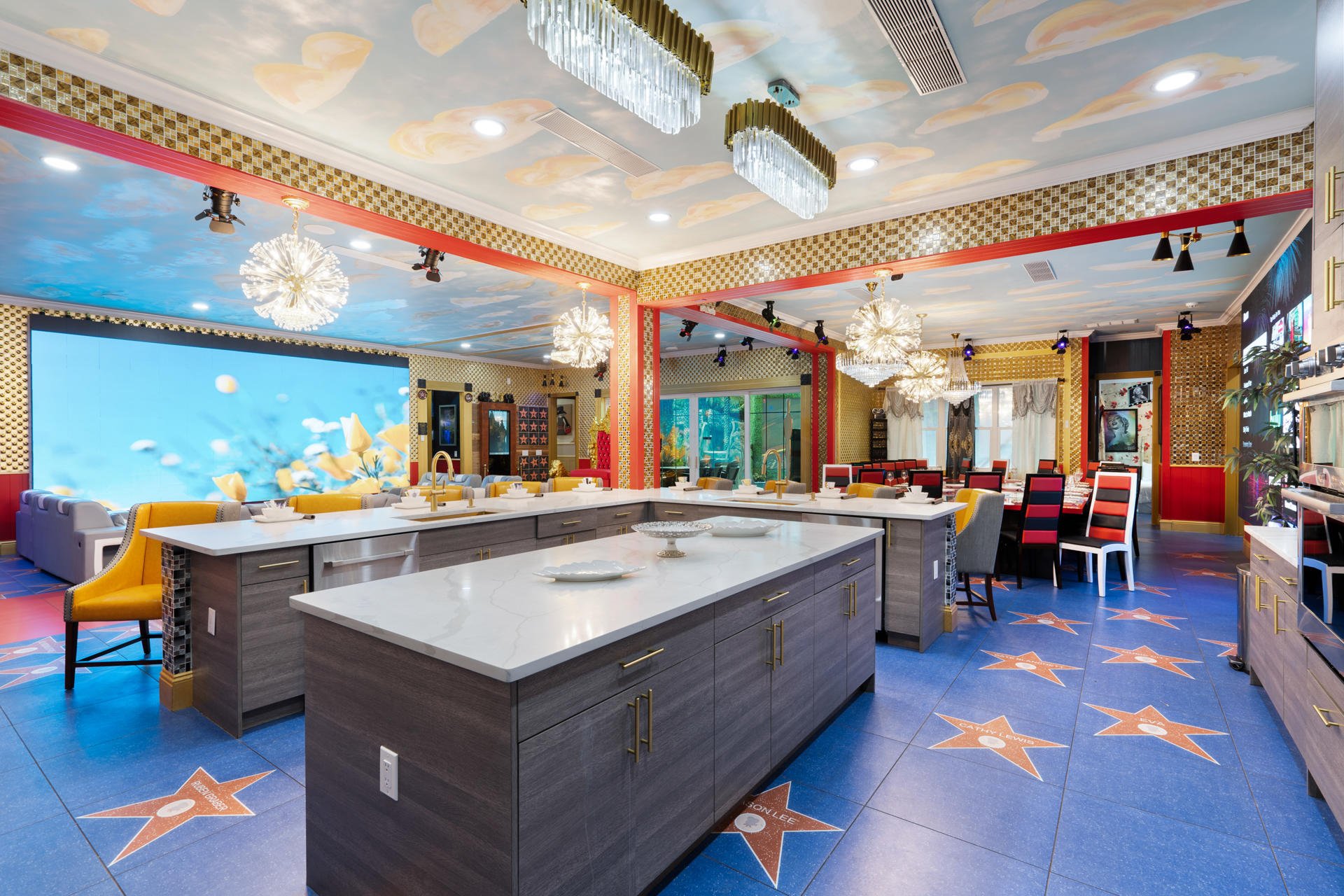 person discussing while standing in front of a large screen in front of people inside dim-lighted room