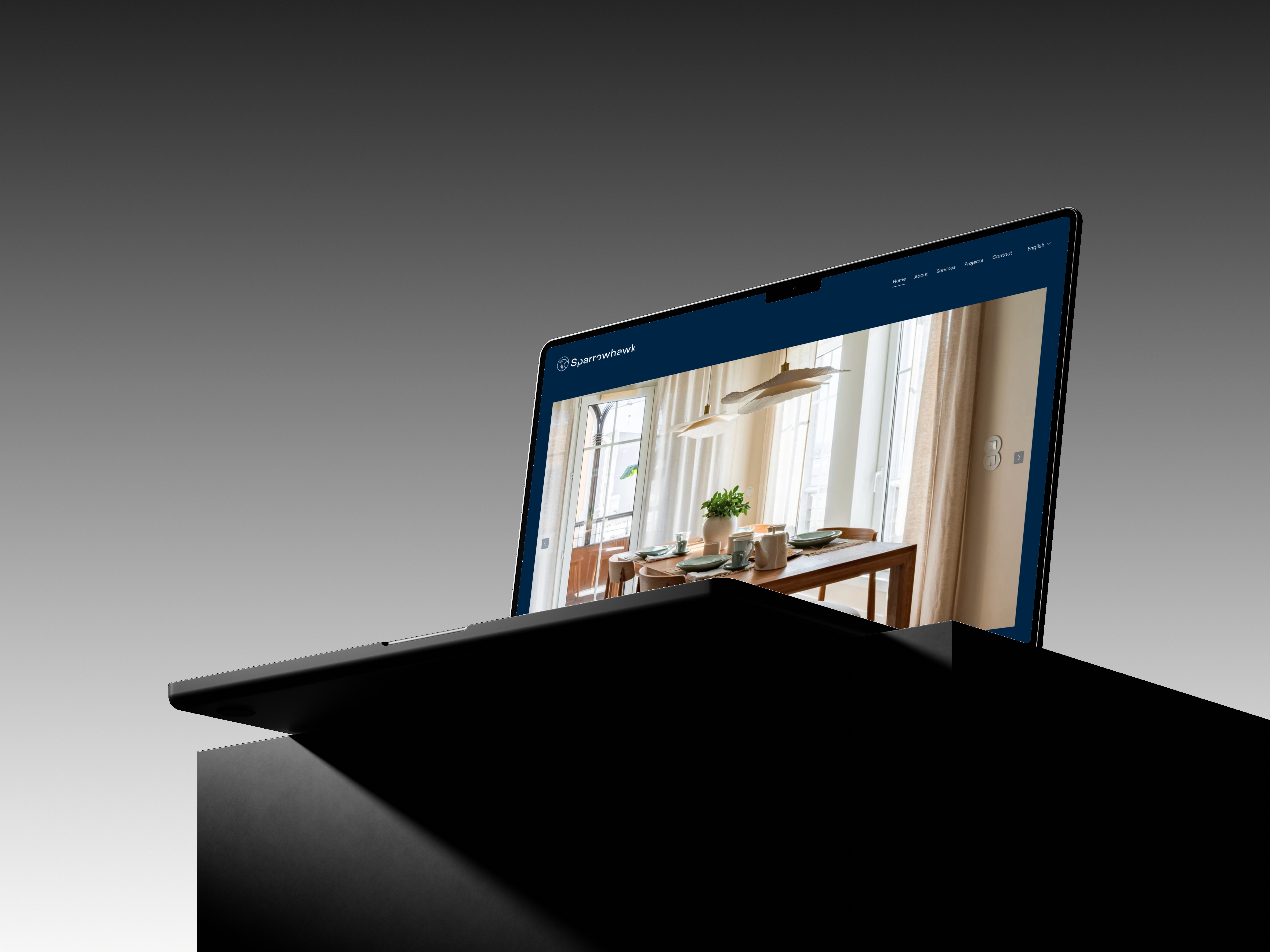 an image showing the website on an macbook of a construction and real estate management company
