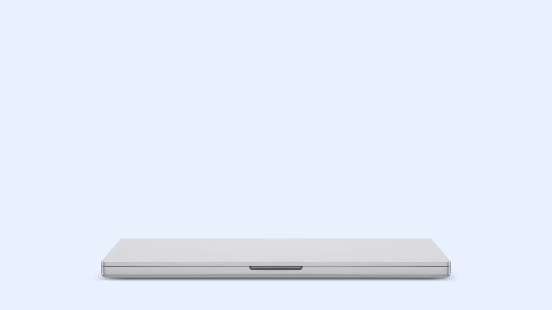 Geschlossender Laptop auf hellblauen Hintergrund.