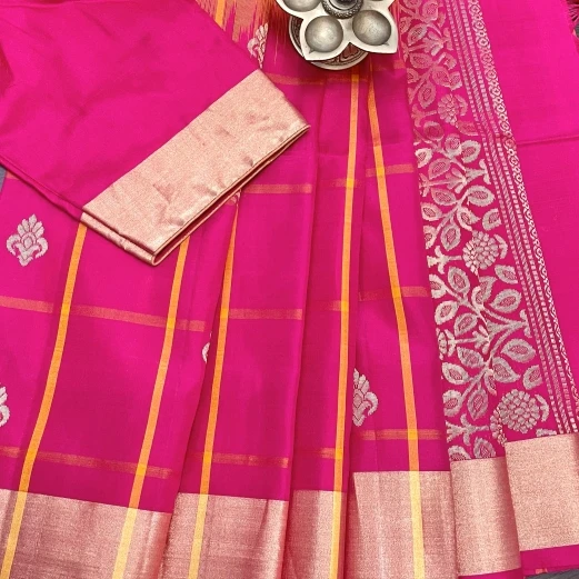 Bright Yellow Silk Saree With Floral Zari Motifs