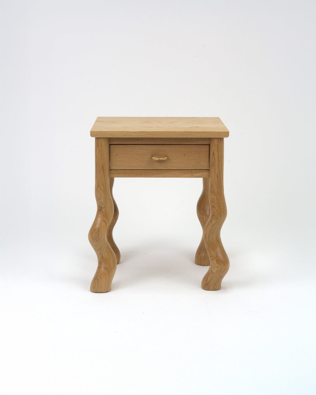 Dancing Bedside Table in Oak front on white background