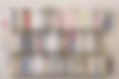 A blurred bookshelf.