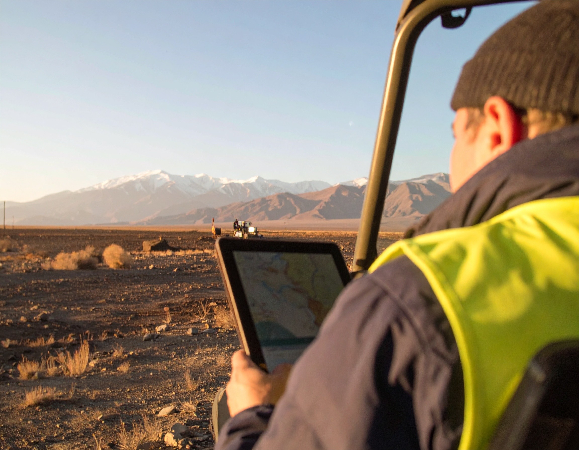 aerial photography of grass field with blue solar panels