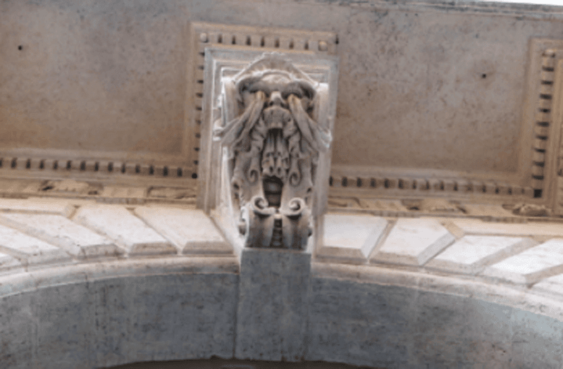 photo of window decorations of a building in Rome
