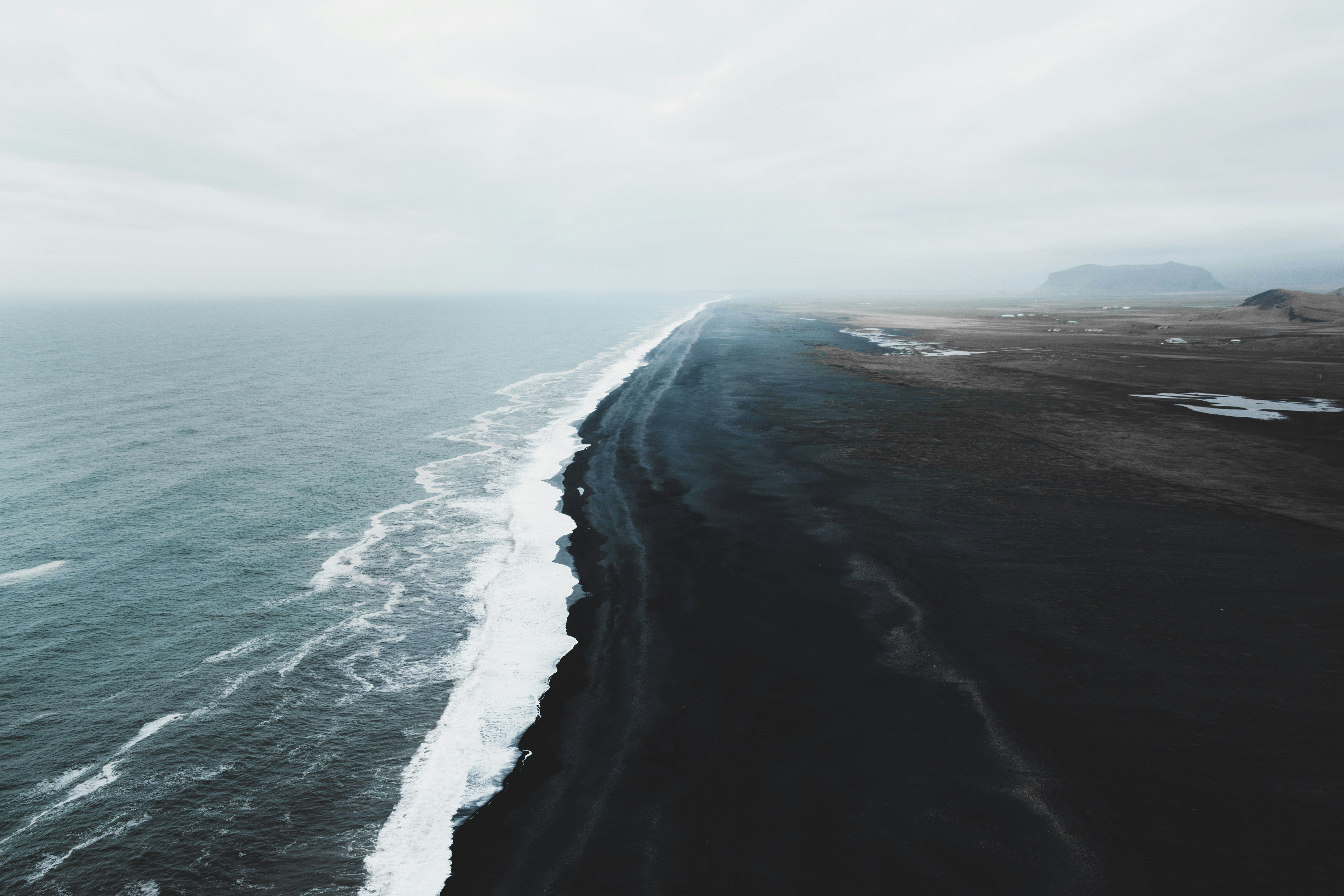 Long stretch of black sand beach along the South Coast of Iceland.