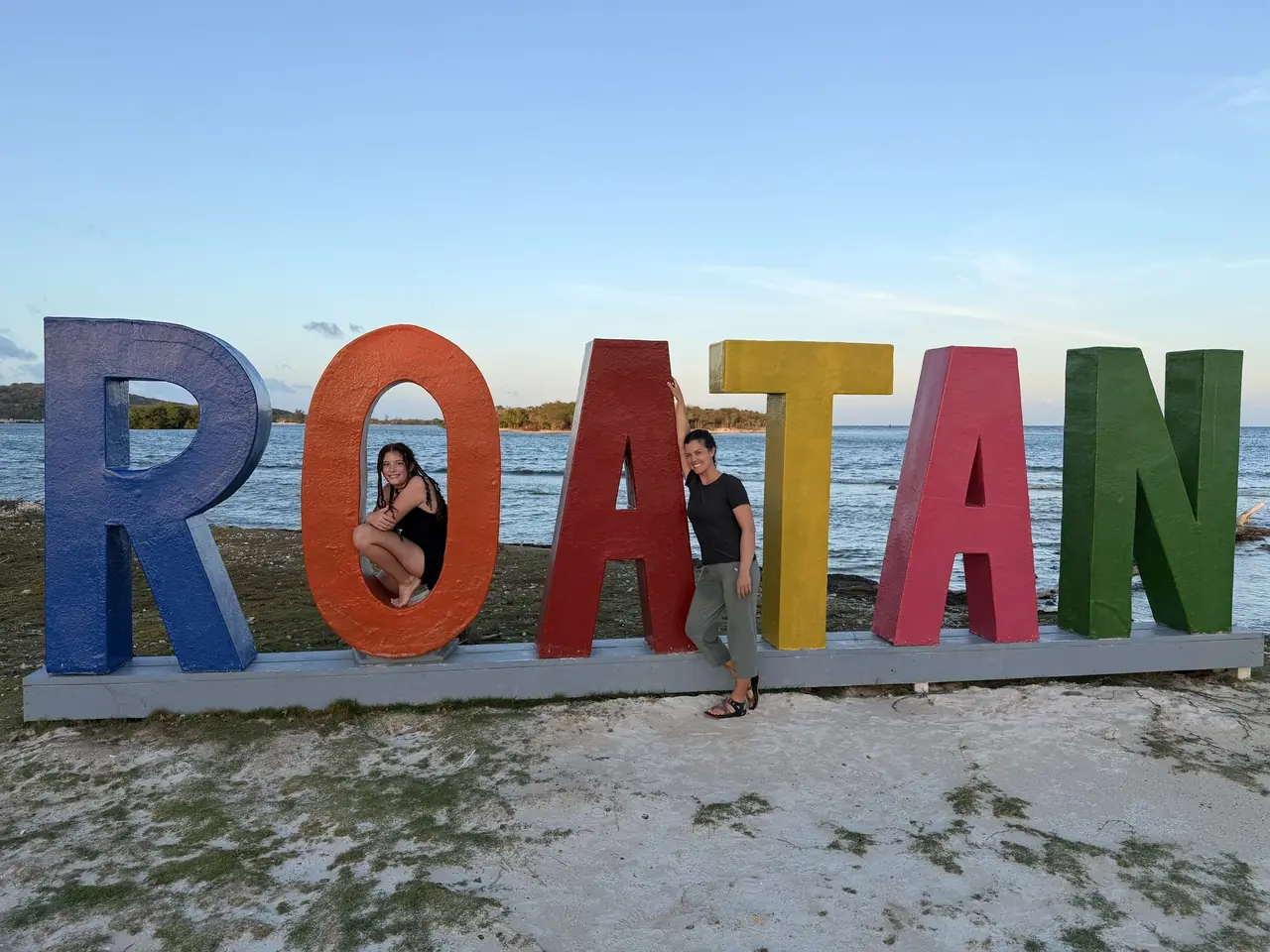 The colorful Roatán sign on the beach at Las Palmas in Dixon Cove, a popular photo stop.