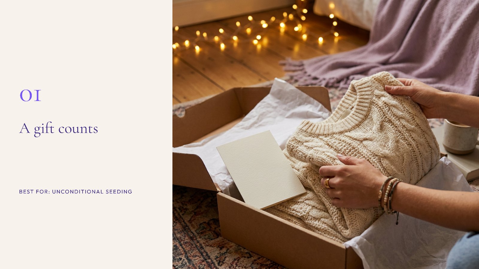 A creator unboxing a gifted cream cable-knit sweater from a tissue-lined box with a blank card