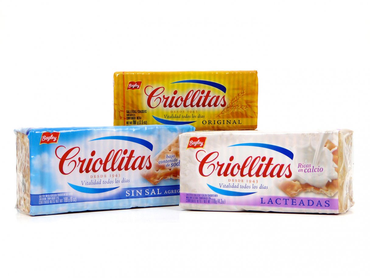 Rooftops of a coastal town with the sea in background