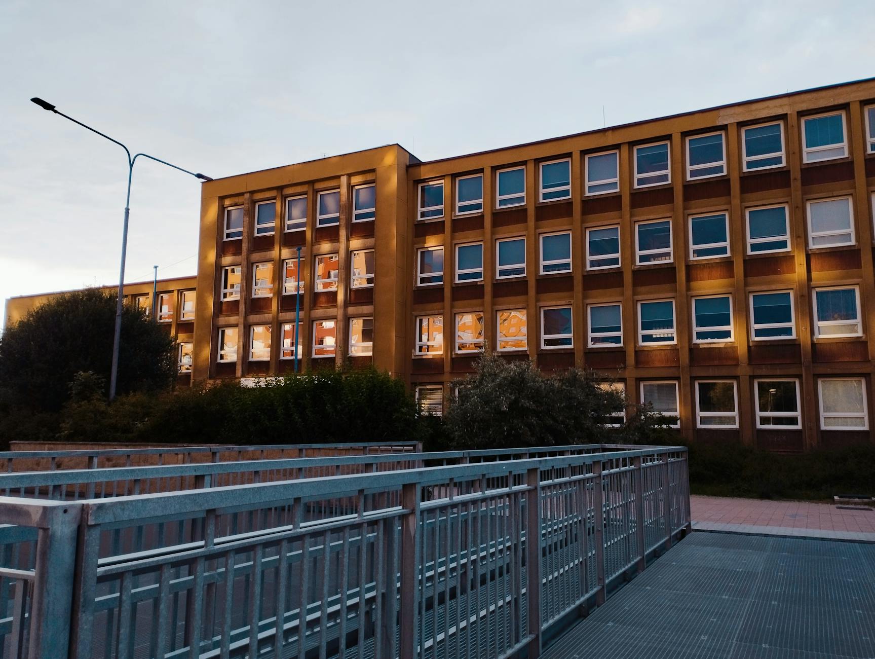 A wide shot of a diverse group of happy children graduating from their best brain learning center program.