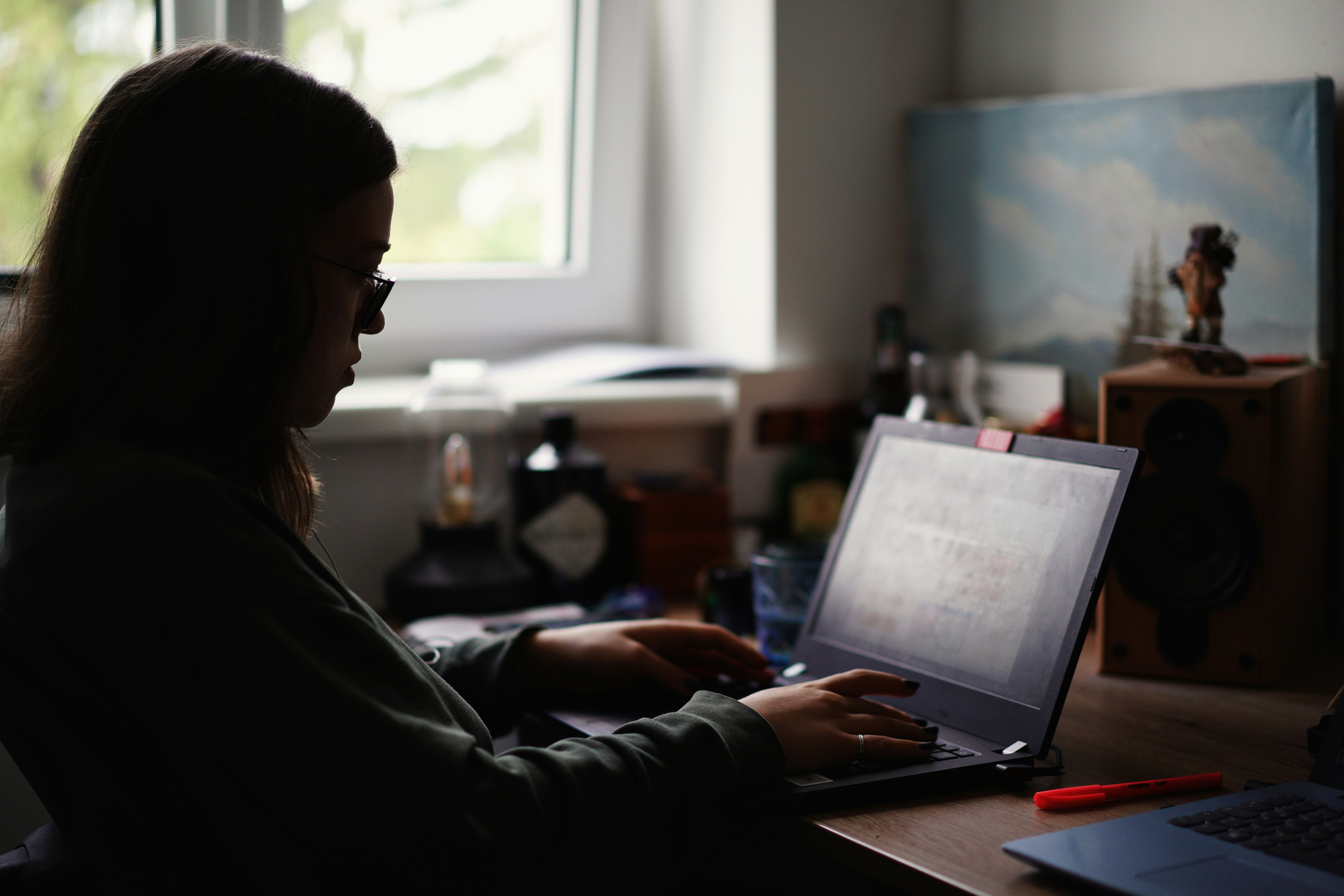 person infront of laptop - Cryptocurrency Courses